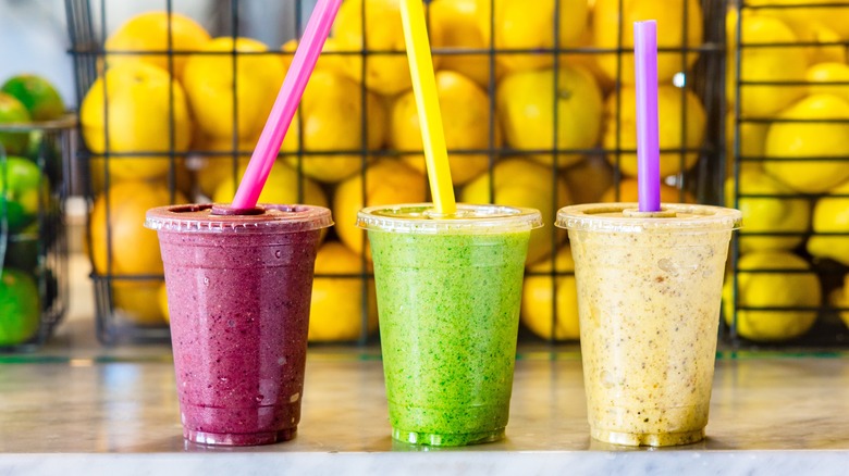 three smoothies on counter