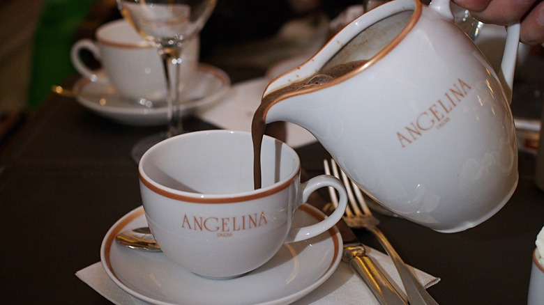 Hot chocolate being poured into a cup at Angelina