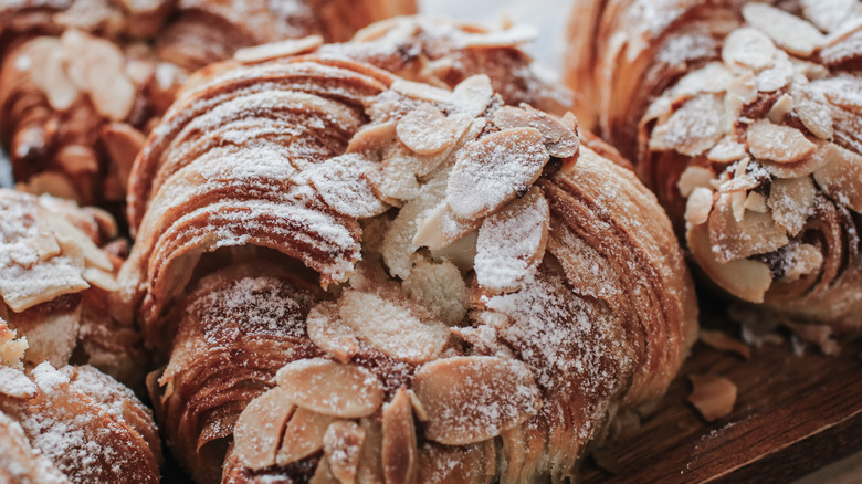 almond croissants dusted with sugar