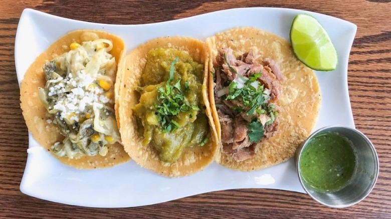 Three tacos on a plate, from El Buen Comer in San Francisco