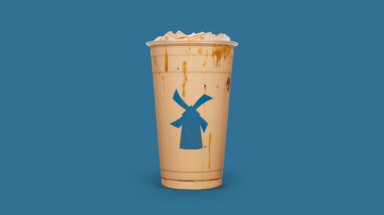 the Golden Eagle in a Dutch Bros cup with a blue background