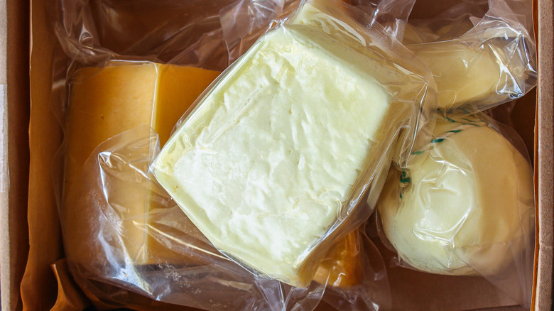 A variety of cheeses vacuum-sealed for shipment