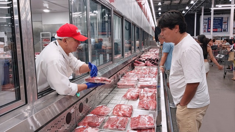 customer buying beef at Costco