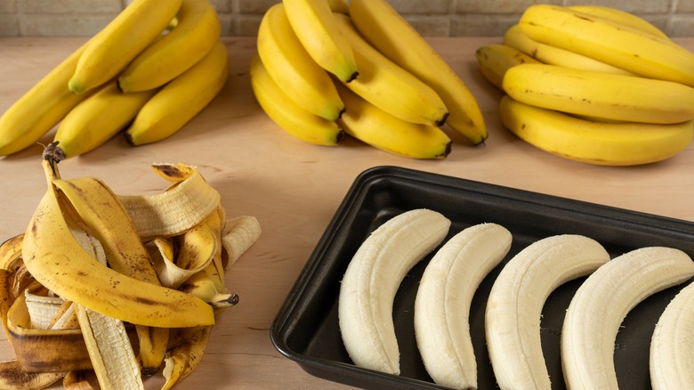 Peeled bananas and banana piles