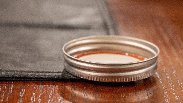Mason jar lid set on the kitchen table