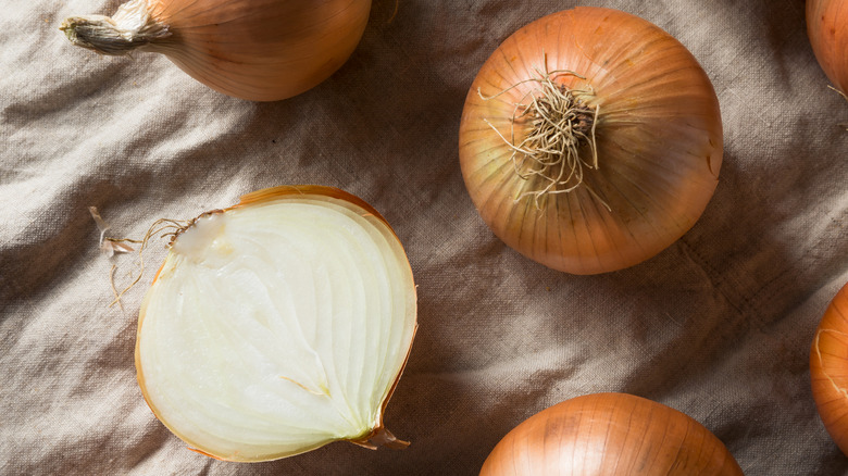 sweet onions, one sliced
