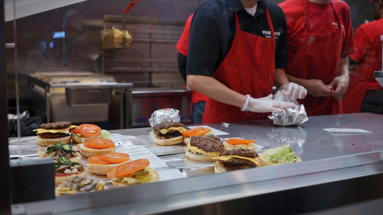 Five Guys burgers being prepared