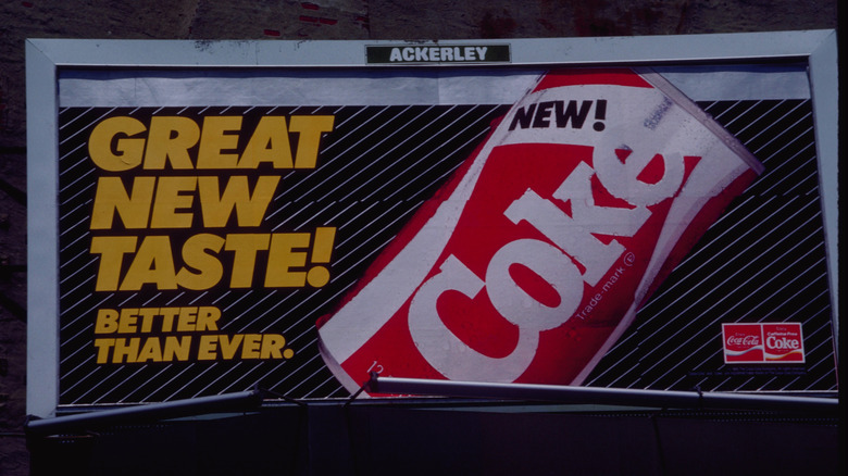 An old billboard for New Coke