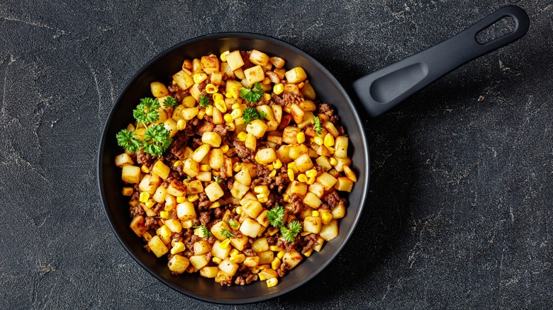 Corn with beef in skillet