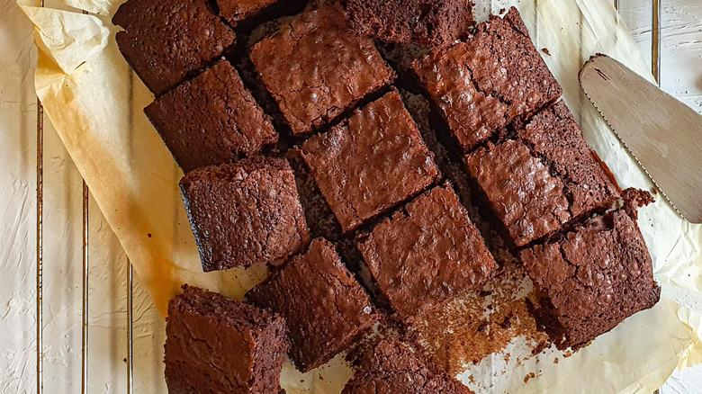 Betty Crocker cake mix cut into squared on parchment paper