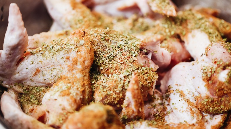 Chicken covered in dried parsley