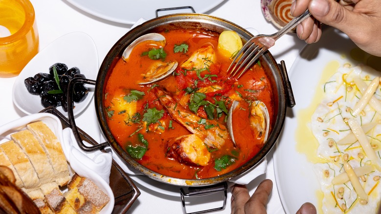 Bouillabaisse stew on table