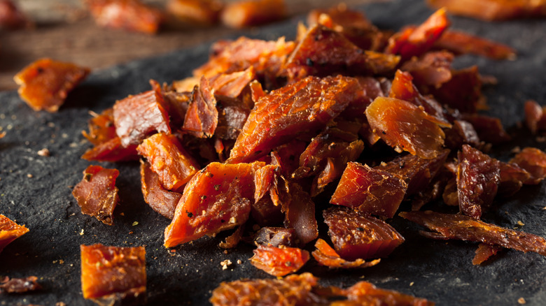 Pile of dried smoked fish jerky pieces