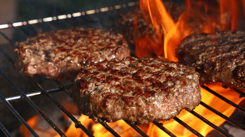 Close-up of burgers on grill