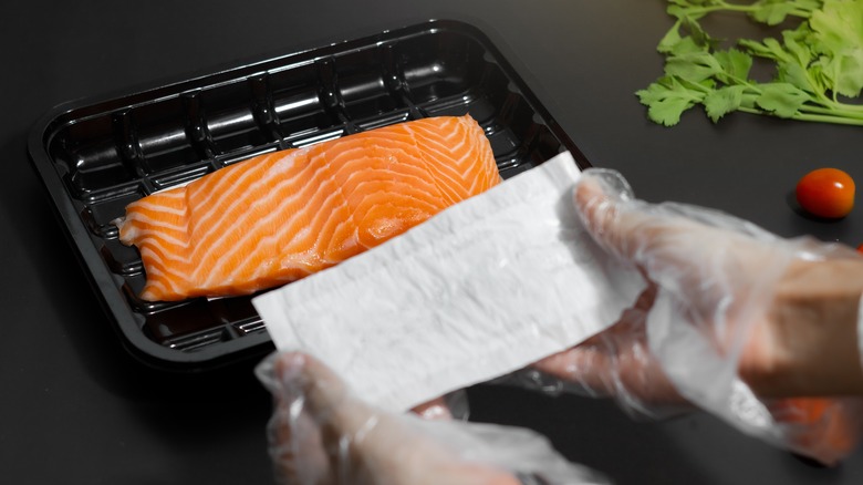 absorbent pad over salmon 