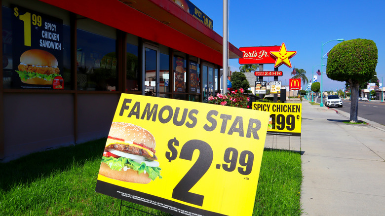 Sign for Famous Star burger at Carl's Jr.