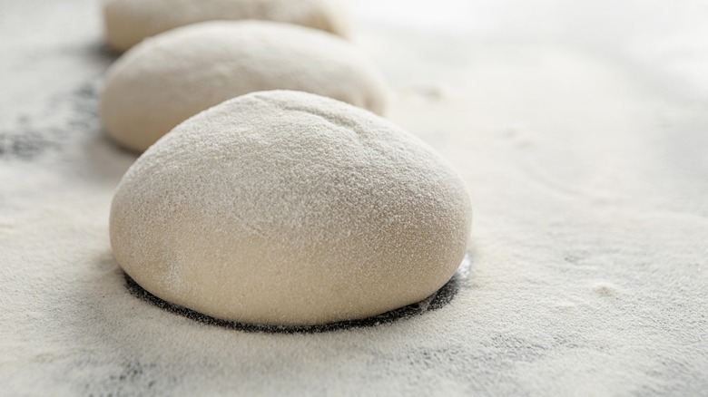 balls of dough dusted in flour