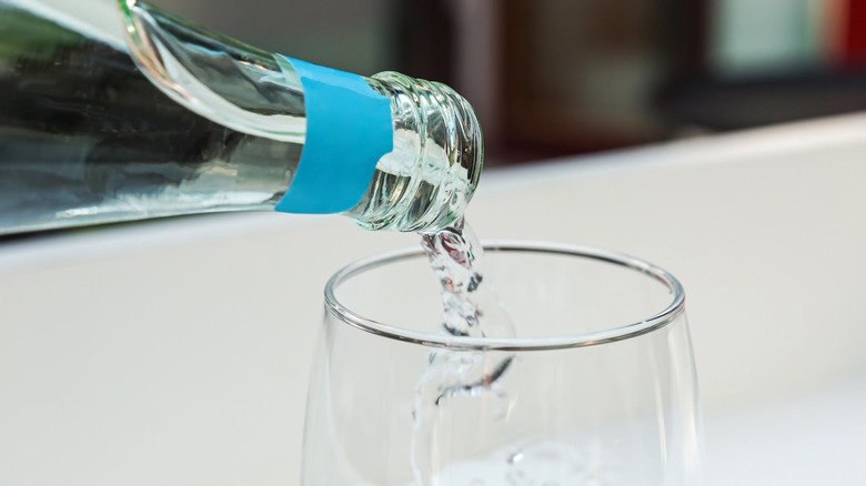 sparkling water poured into glass