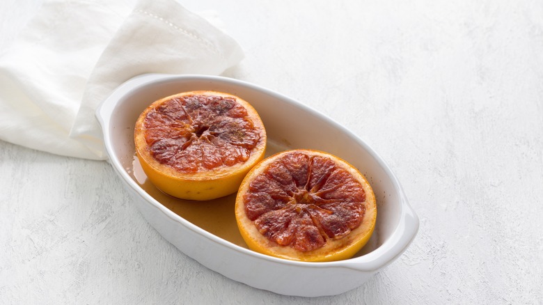 Baked grapefruit in a white dish