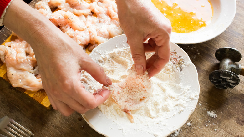 dredging raw chicken