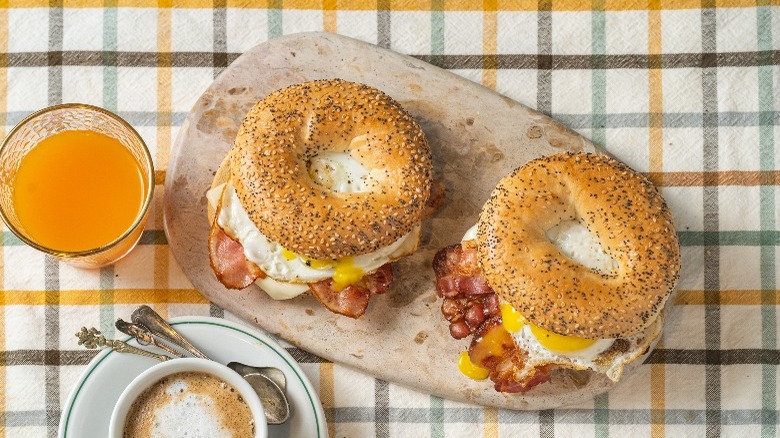 Breakfast sandwiches with juice and coffee