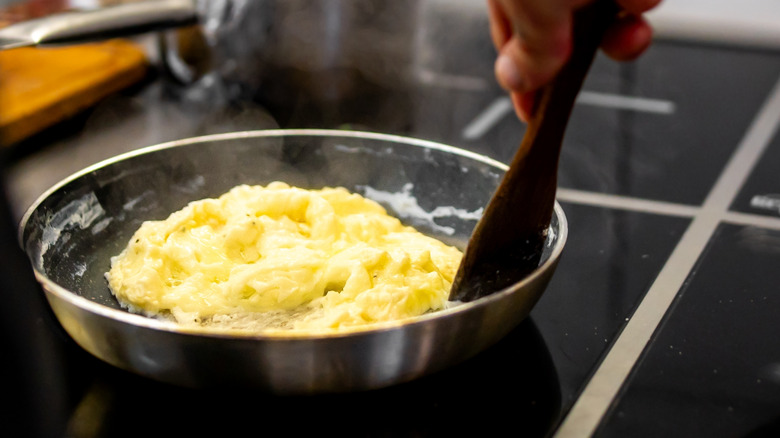 cooking scrambled eggs