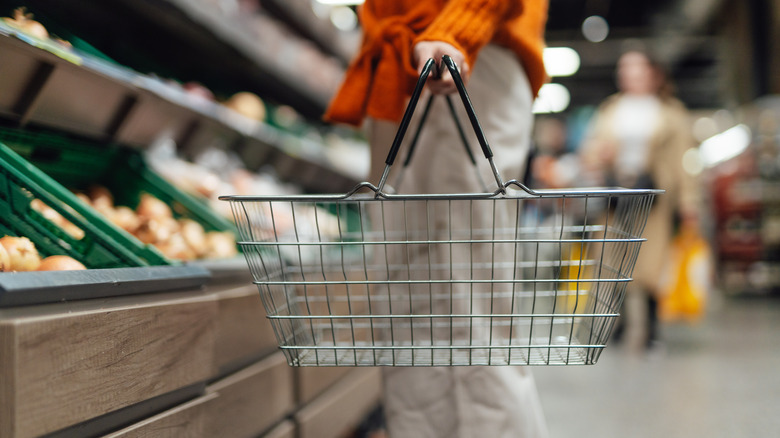 Shopper with empty basket