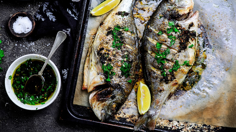 Broiled fish on a baking sheet