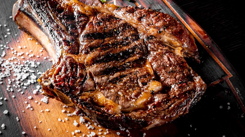 Ribeye steak on cutting board 