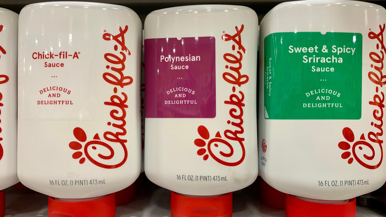 Chick-fil-A sauce bottles sit on store shelves