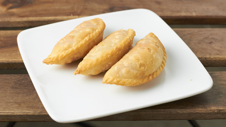 A plate of Malaysian curry puffs
