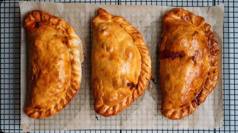 Cornish pasties cooling on a rack
