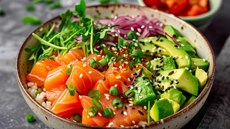 Poke bowl with fish and avocado