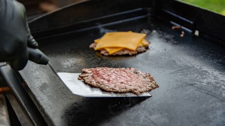 smash burger on a griddle