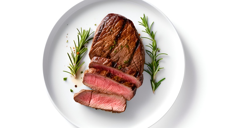 Steak on a white plate