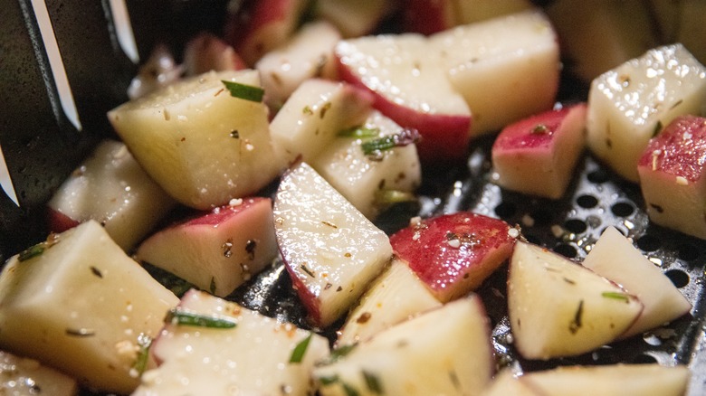 Potatoes cooking in air fryer