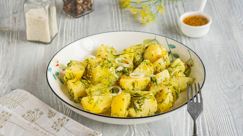 Potato salad on table