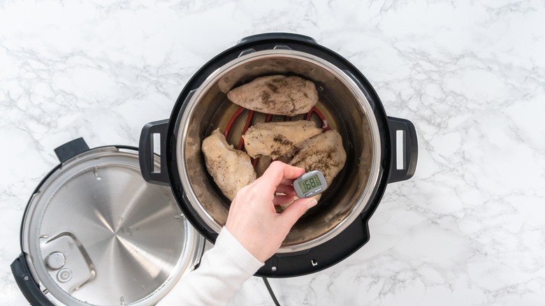 Checking pressure cooker chicken temperature