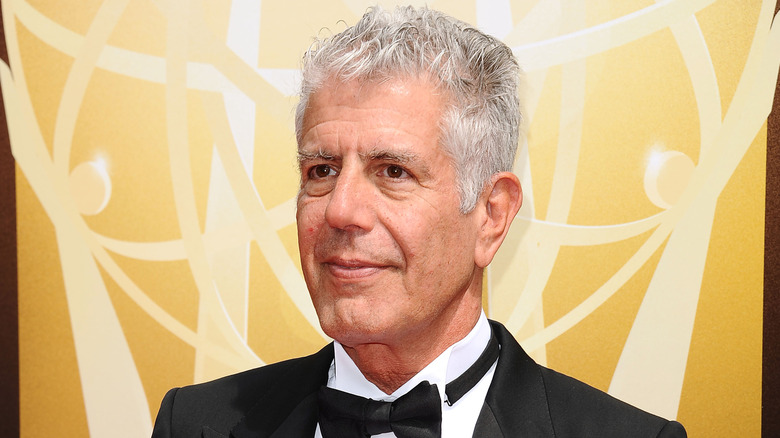 Anthony Bourdain in Tuxedo with Gold Backdrop