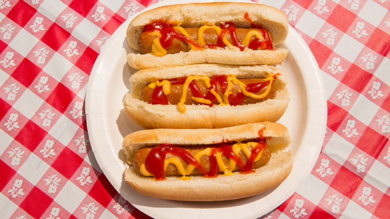 Hot dogs on picnic table cloth