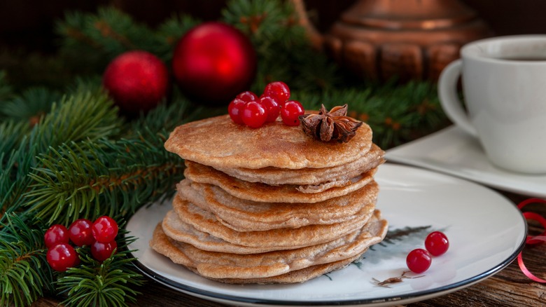 buckwheat pancakes with berries and syrup