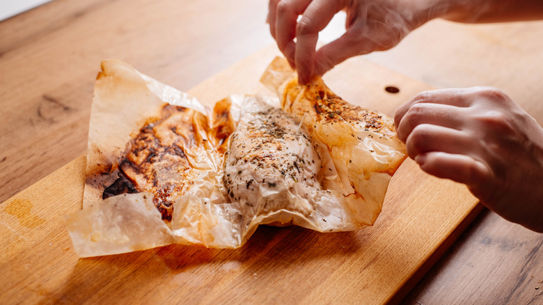 Cooked chicken breast in parchment