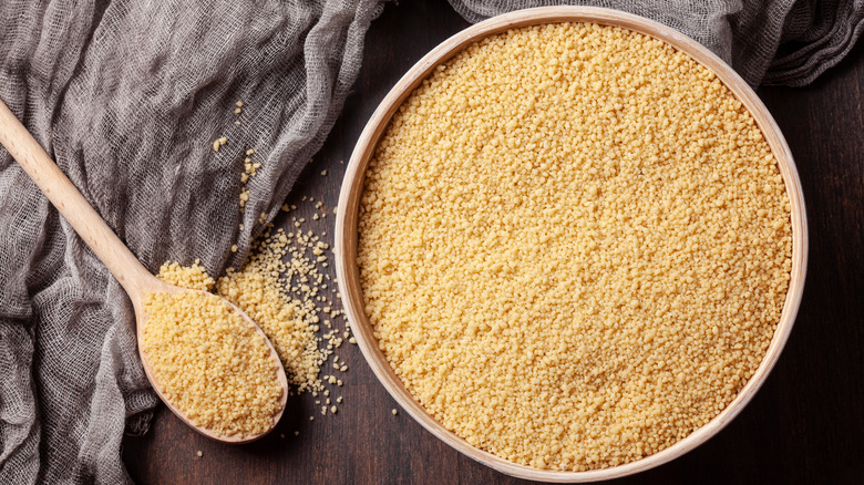 Spoon and bowl of couscous