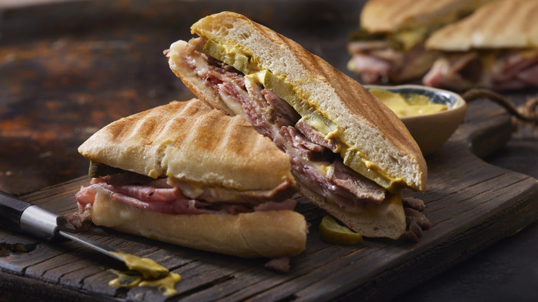 Pressed Cuban Sandwich on Cutting Board