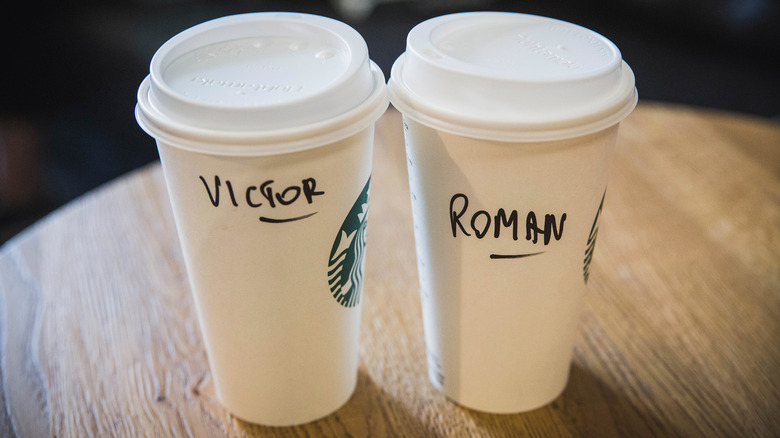 Starbucks cups with names written on them