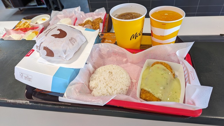 A tray of food with drinks from McDonald's Philippines