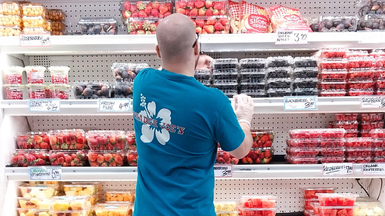 A Trader Joe's employee stocks fresh berries