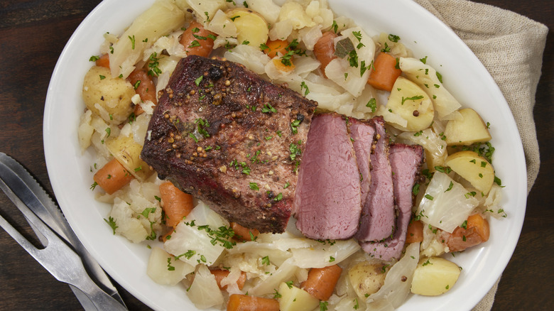 platter of corned beef, cabbage, potatoes, and carrots