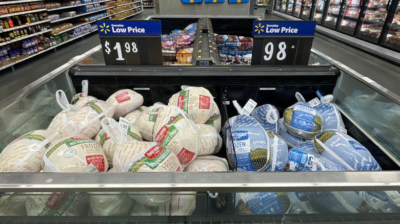 Frozen food section filled with turkeys