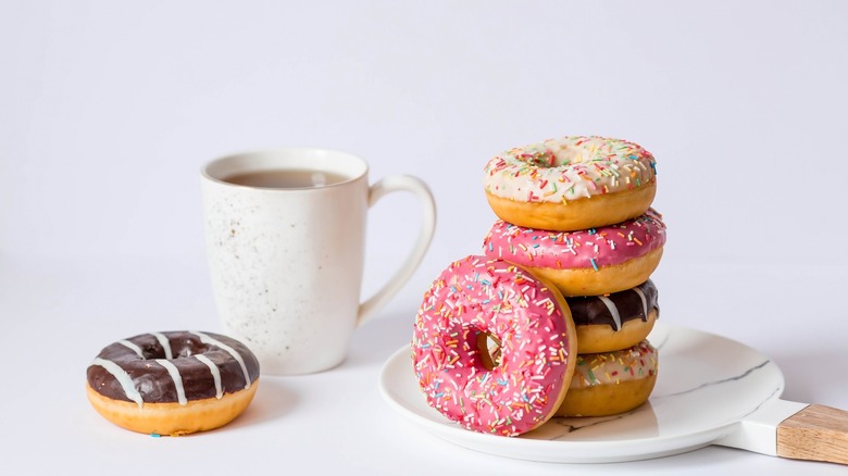 Stack of donuts with coffee